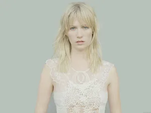 January Jones Dazzling In Elegant White Dress Wallpaper