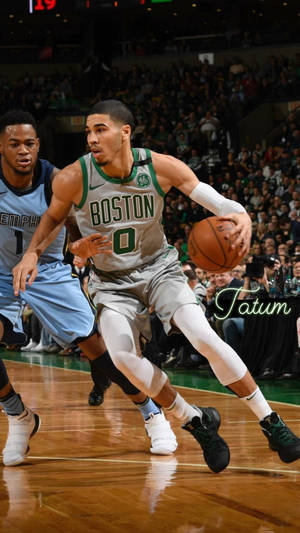 Jayson Tatum In Action: An Epitome Of Athletic Excellence Wallpaper