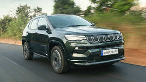 Jeep Compass Driving Blurred Effect Wallpaper