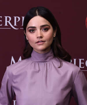 Jenna Coleman Smiling Elegantly Wallpaper