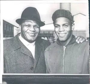 Jersey Joe Walcott And His Grandson Wallpaper