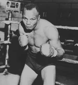 Jersey Joe Walcott Posing Inside The Boxing Ring Wallpaper