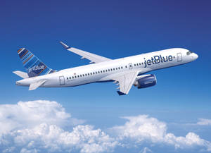 Jetblue Flight On Blue Cloudy Skies Wallpaper