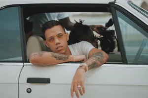 Jhay Cortez In Car Wallpaper