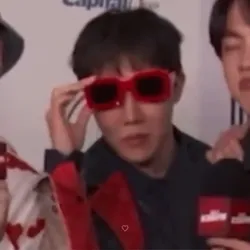 Jhope From Bts Exuding Radiance And Charm Wallpaper