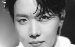 Jhope From Bts Striking A Cool Pose At A Photoshoot. Wallpaper