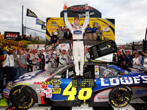 Jimmie Johnson Speeding On The Racetrack Wallpaper