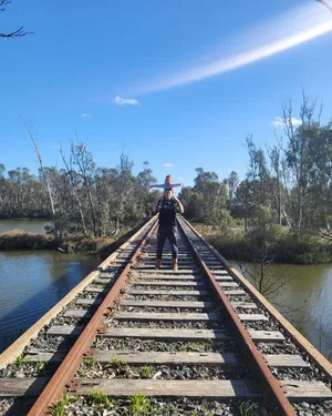 Jimmy Crute On Old Train Tracks With A Child Wallpaper