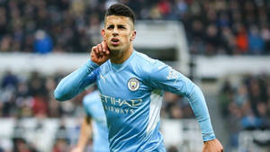 Joao Cancelo Squinting Wallpaper