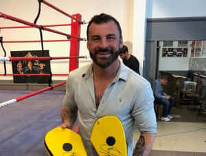 Joe Calzaghe Signing His Fan's Punching Mitts Wallpaper