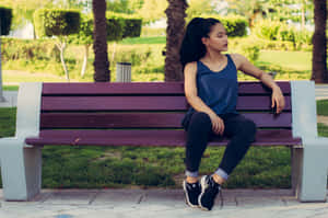 Jogging Girl Sit Down Wallpaper