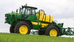 John Deere Sprayer On Grass Wallpaper