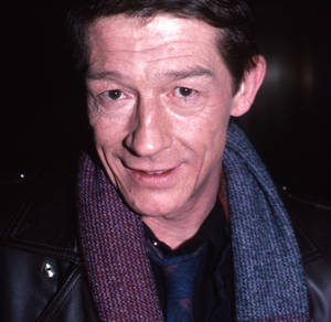 John Hurt Wearing Scarf Wallpaper