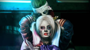 Joker And Harley Quinn Sinister Embrace Wallpaper