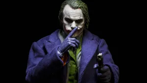 Joker With Gun 4k Ultra Hd Wallpaper