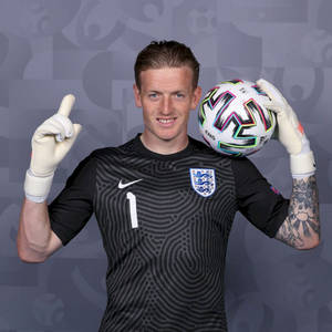 Jordan Pickford Posing With Football Wallpaper