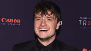 Josh Hutcherson Smilingat Event Wallpaper