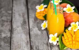 Juices With Mangoes And Flowers Wallpaper