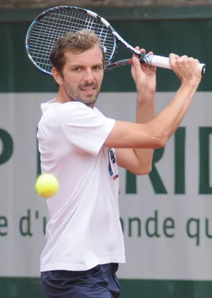 Julien Benneteau With Two-handed Backhand Stroke Wallpaper