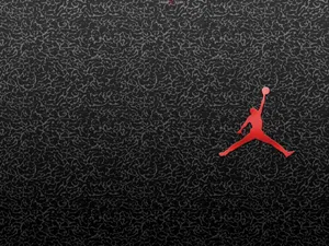 Jump To Victory With The Air Jordan Basketball Logo Wallpaper