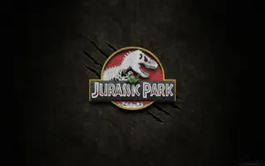 Jurassic Park Logo In Black Hue Wallpaper