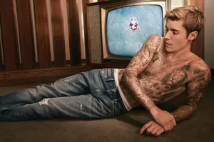 Justin Bieber Strikes A Vintage Pose Wallpaper