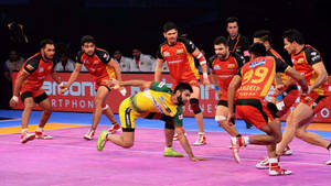 Kabaddi Yellow Versus Red Wallpaper