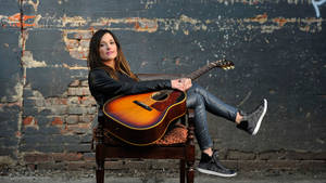 Kacey Musgraves With Guitar Wallpaper