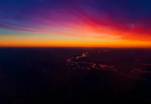 Kaleidoscopic Sunset Sky In Riga Wallpaper