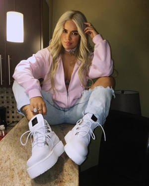 Karol G On Puma Shoes Wallpaper