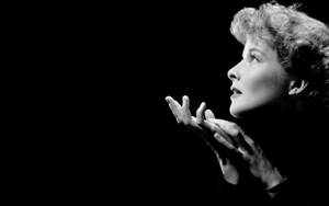 Katharine Hepburn On A Solid Black Background Wallpaper