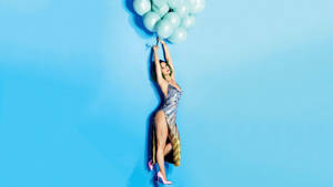 Katy Perry Celebrates With Blue Balloons Wallpaper