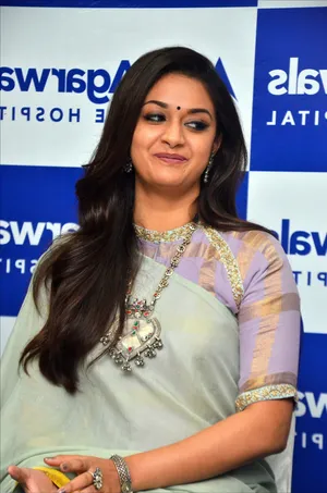 Keerthi Suresh In Hd At A Promotional Event Wallpaper