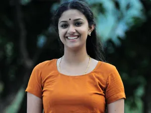 Keerthi Suresh In Orange Shirt Hd Wallpaper