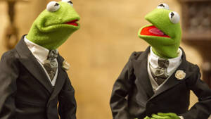 Kermit The Frog Interacting With His Look-alike In Muppets Most Wanted. Wallpaper