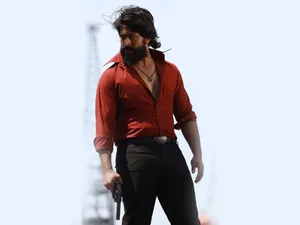 Kgf Yash With Gun Wallpaper