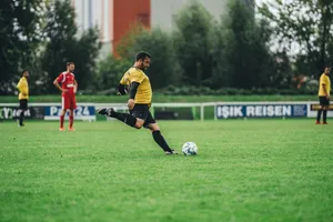 Kicking Phone Football Wallpaper