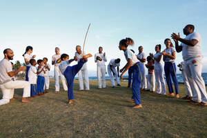 Kids Having Fun At A Capoeira Session Wallpaper