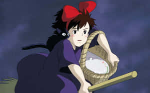 Kiki's Delivery Service - Kiki Soaring Over The City On Her Broomstick Wallpaper