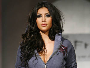 Kim Kardashian Poses In A Grey Hoodie Wallpaper