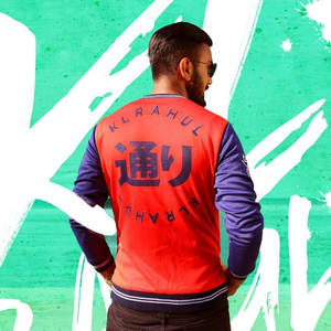 Kl Rahul Wearing A Red Fitted Varsity Jacket Wallpaper