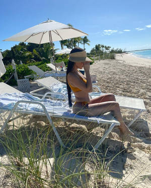 Kourtney Kardashian At The Seashore Wallpaper