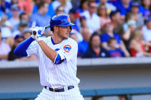 Kris Bryant Batting In White Uniform Wallpaper