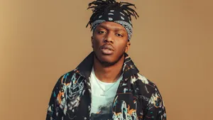 Ksi With Brown Background Wallpaper