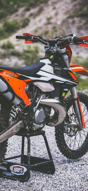 Ktm Adventure On Rocky Terrain Wallpaper