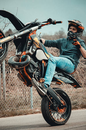 Ktm Bike During Wheelie Wallpaper