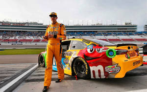 Kyle Busch In Yellow Suit Wallpaper