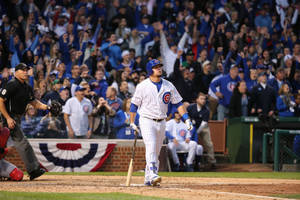 Kyle Schwarber Walking In The Field Wallpaper