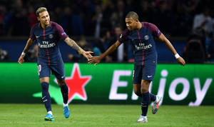 Kylian Mbappe Clapping Neymar's Hand Wallpaper