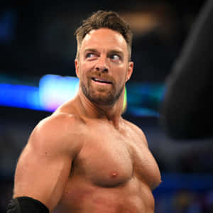 La Knight In Action With A Confident Smirk At Wwe Event. Wallpaper